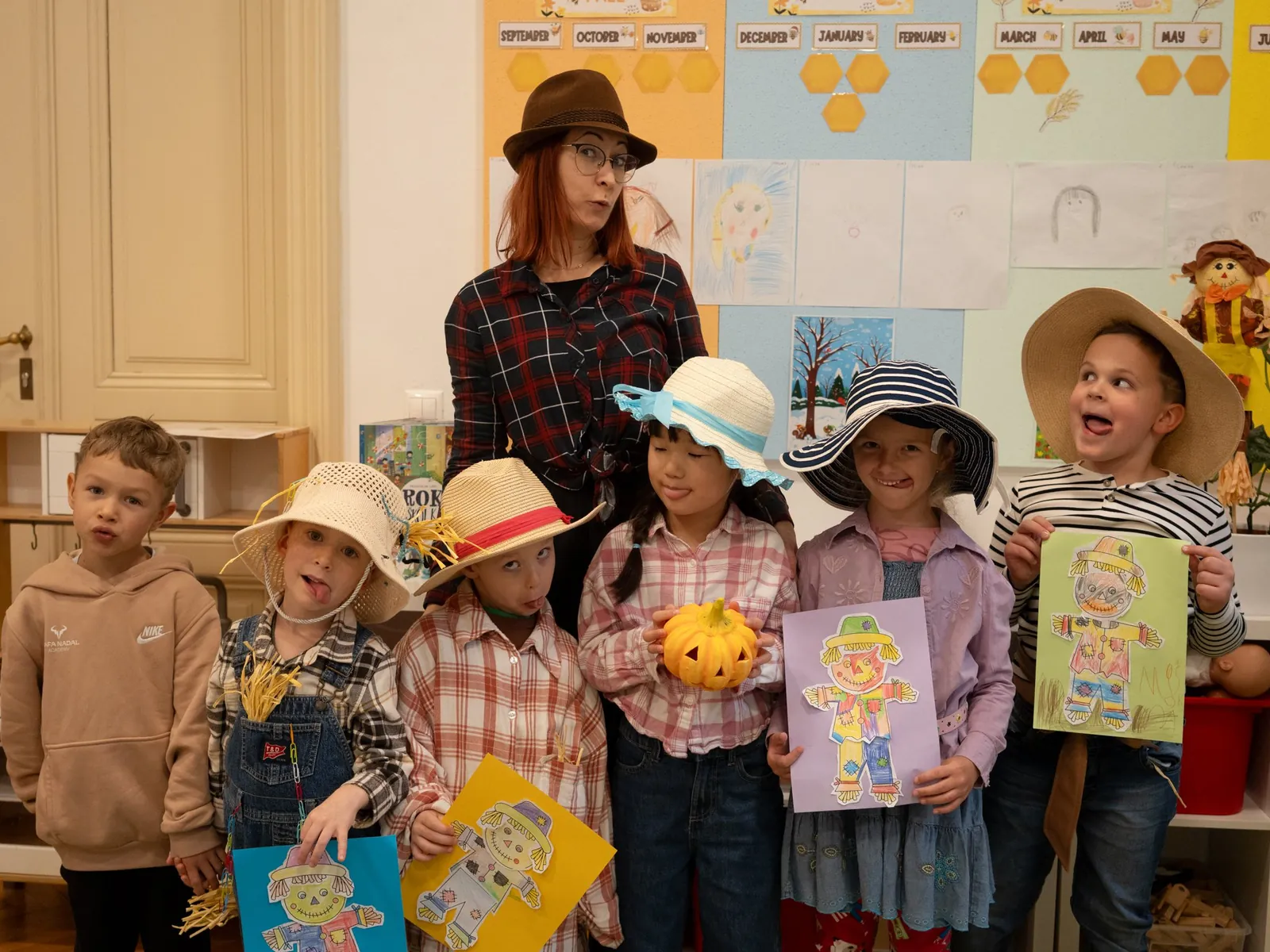 Children and teachers in autumn dress-up at Handprints