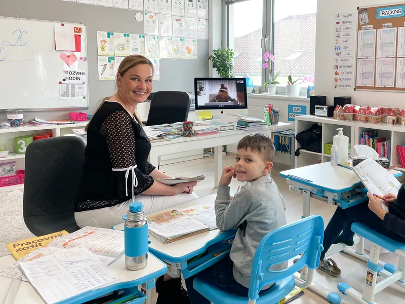 PhDr. Petra Ressel with a child at work